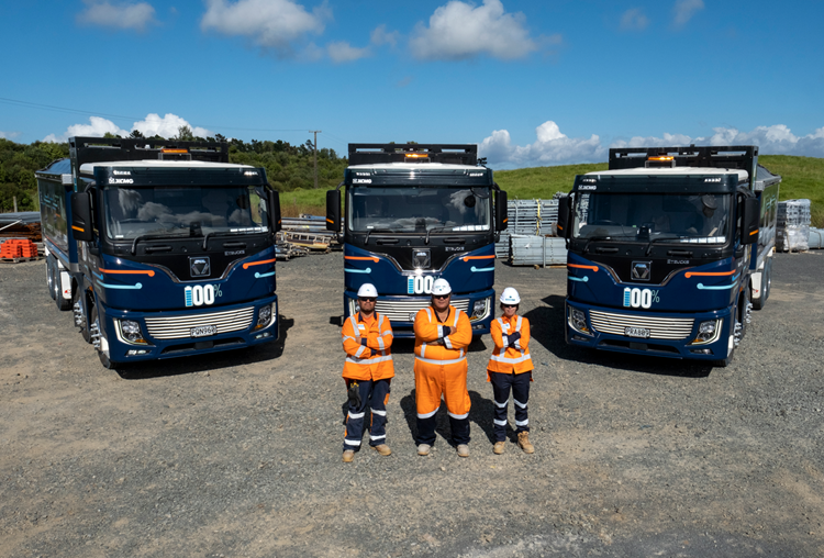 Photo of our e-trucks with their drivers