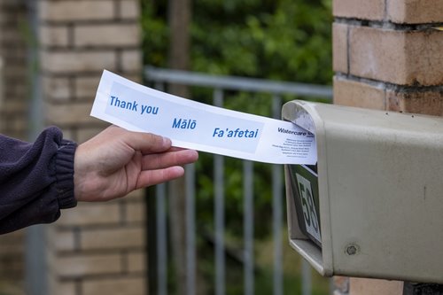 A message in a letterbox about the network investigations in Mangere East