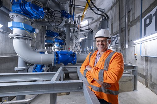 Project manager Dirk Du Plessis stands next to the wastewater pump station’s four submersible pumps 12 metres below ground